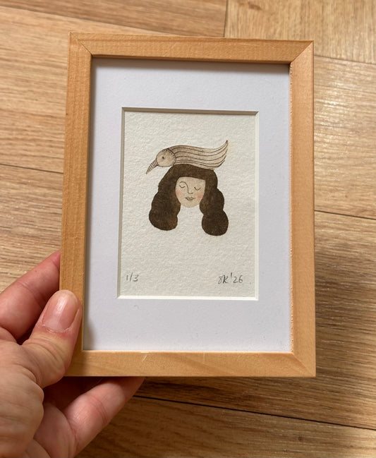 Ingelijste tetraprint vrouw en vogel met passe partout